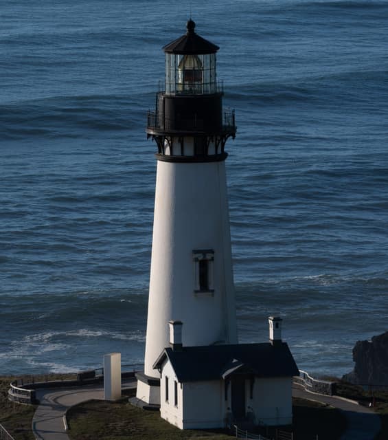 Lighthouse standing over open water