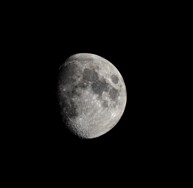 Bright moon over deep shadow