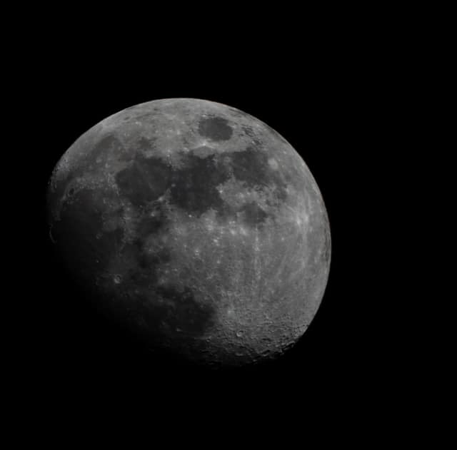 Nearly full moon in gray detail