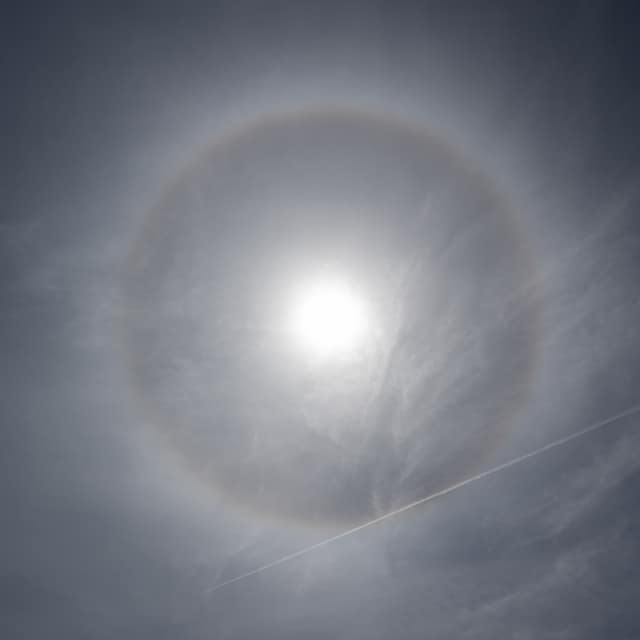 Sun halo through thin clouds